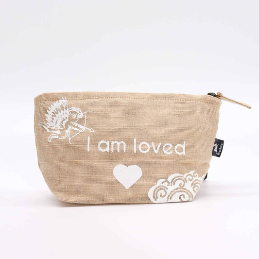 Small natural jute drawstring pouch featuring the text I am Loved in a stylish font.