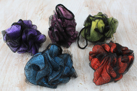 Soft and fluffy luxury bath scrunchie in a vibrant assorted colour for gentle skin exfoliation.