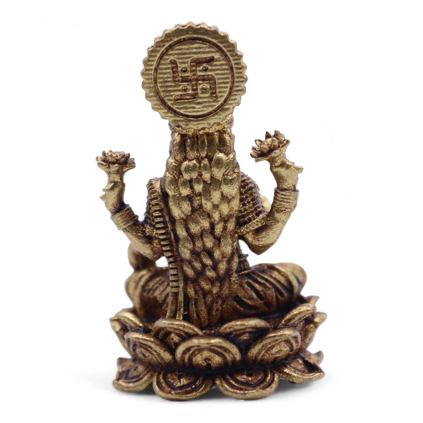 Small handcrafted brass figurine of Goddess Laxmi seated on a lotus base with an ornate crown.