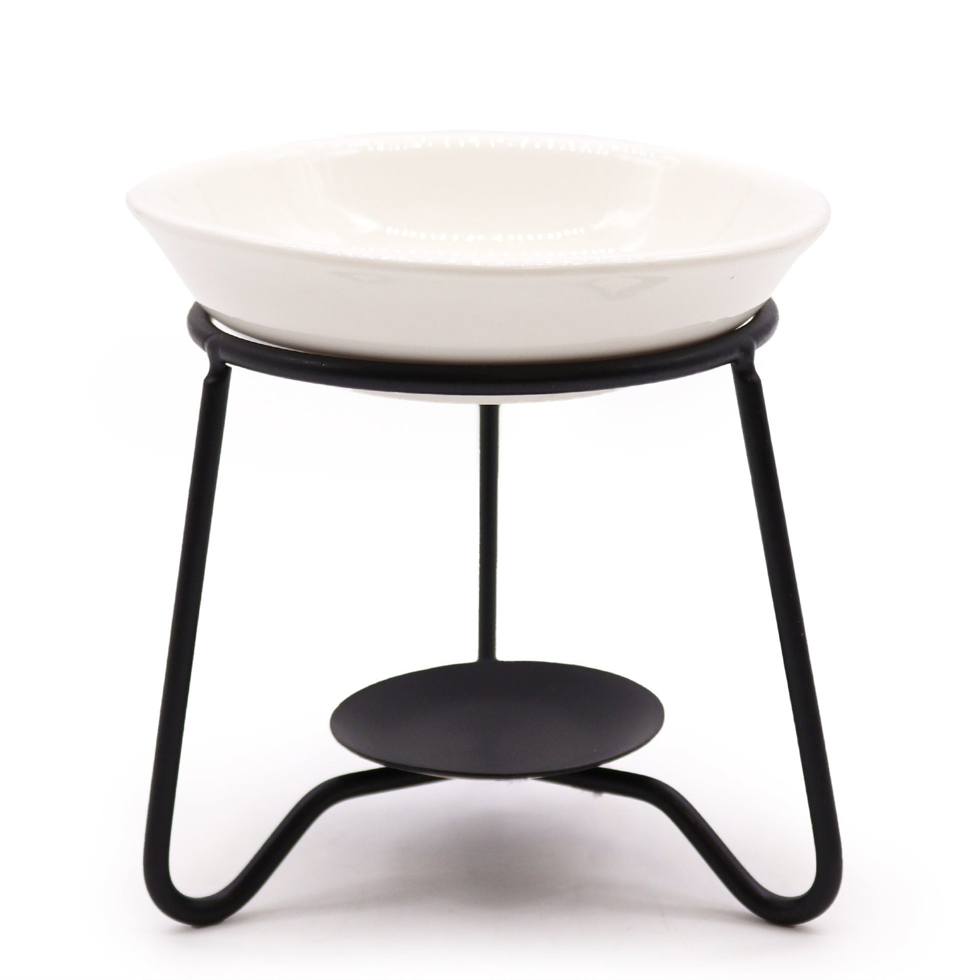 Minimalist oil burner featuring a white ceramic bowl supported by a sleek black metal stand.