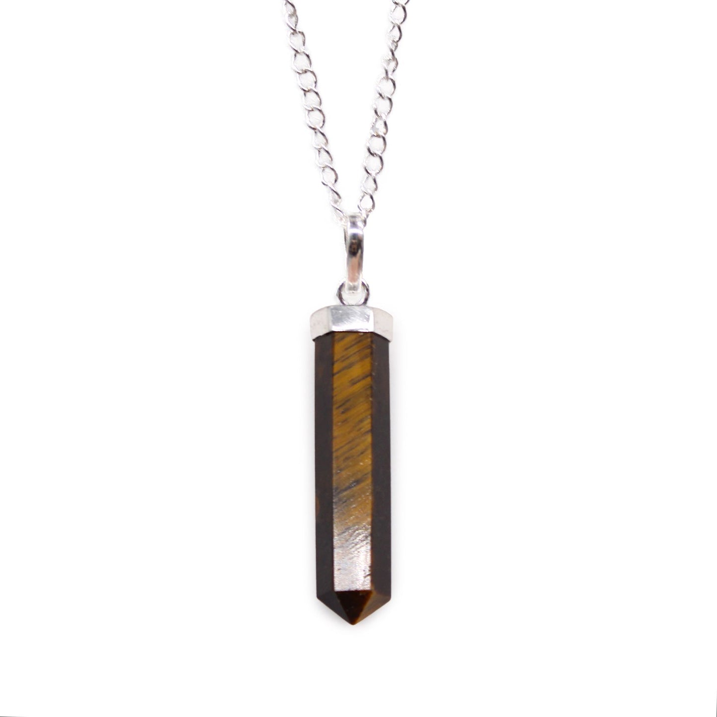 Polished Tiger Eye gemstone carved into a classic hexagonal pointed pendant with a silver-toned bail.