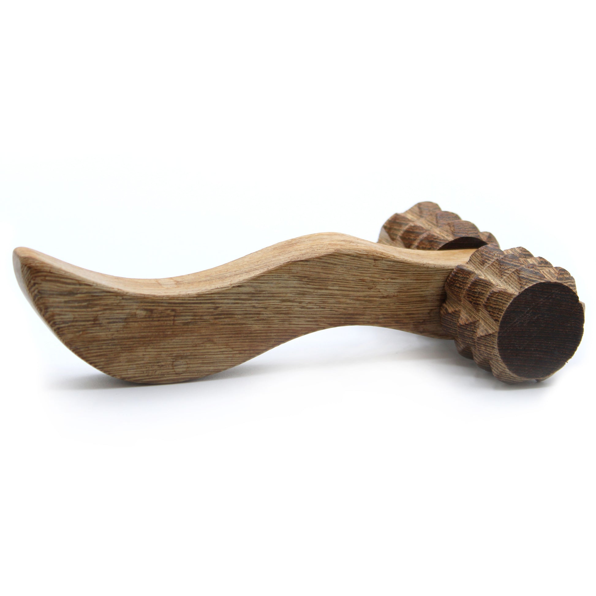 Handheld redwood massage tool with a contoured handle and textured ribbed rollers for muscle relief.