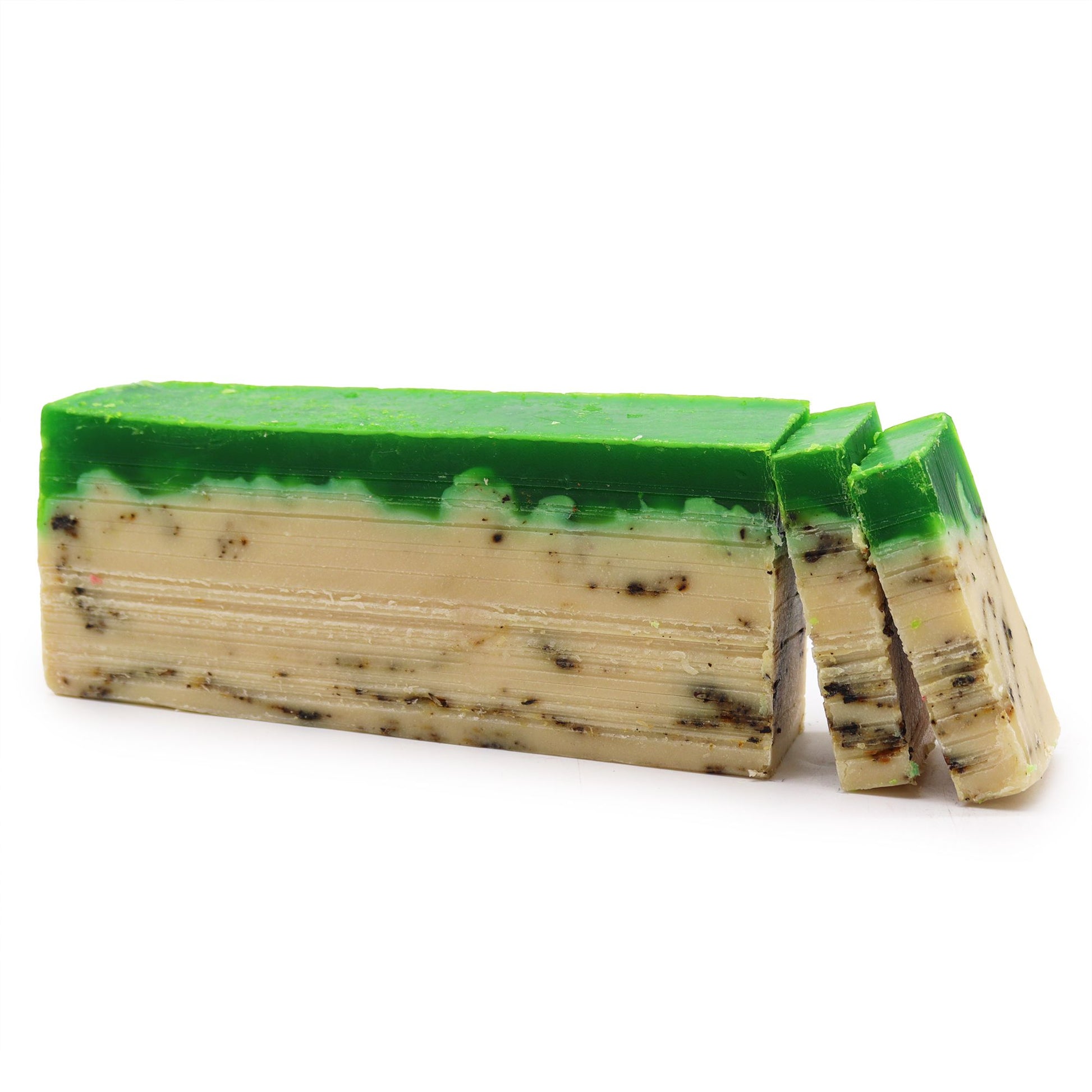 Large green tea and olive oil artisan soap loaf with visible tea leaves for natural exfoliation.