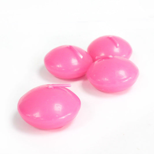 Small round pink unscented floating candle designed for decorative water displays and wedding centrepieces.