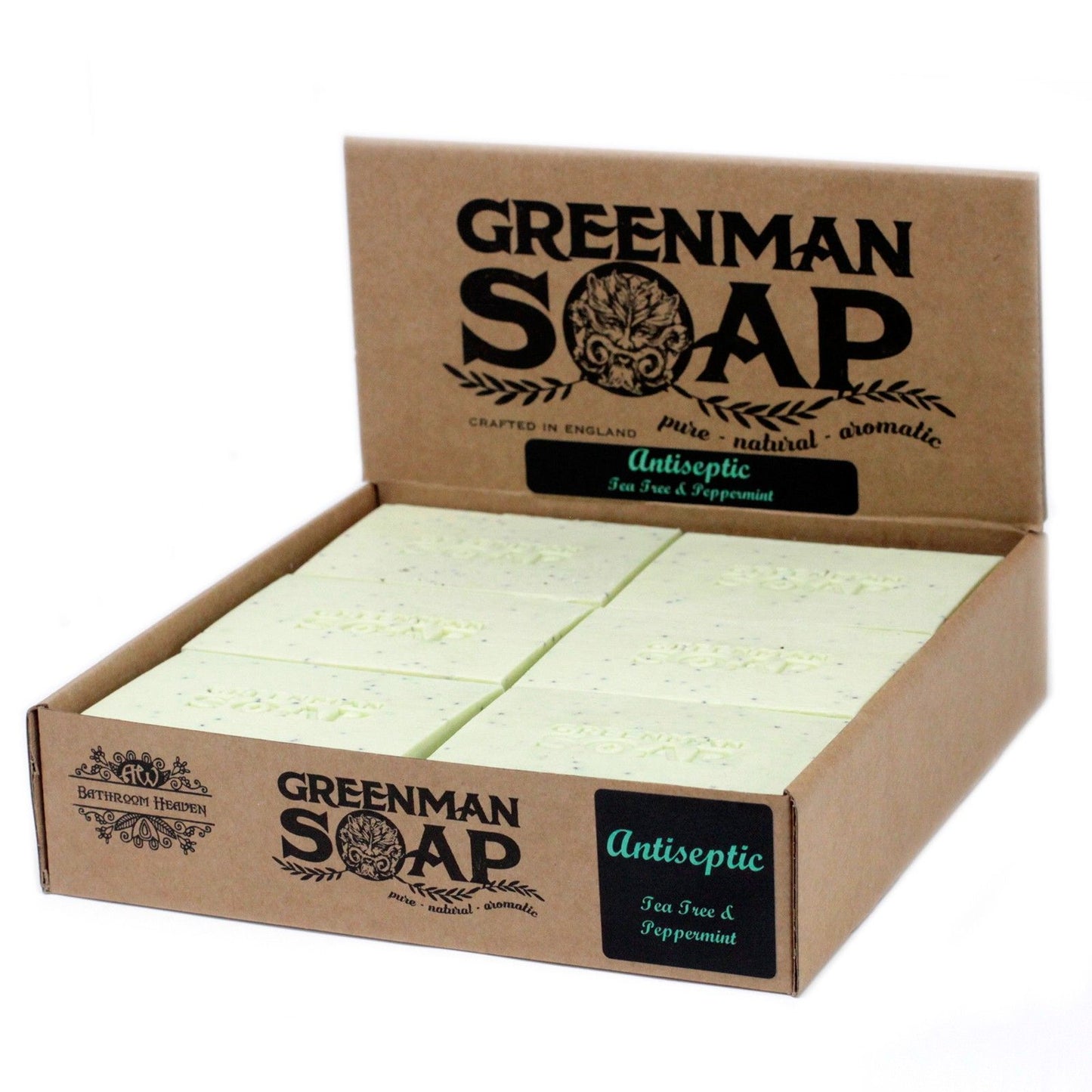 Handcrafted green soap slice with exfoliating poppy seeds and aromatic botanicals on a neutral background.