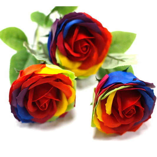 Vibrant rainbow coloured soap flowers arranged in a beautiful gift box for a luxurious home spa experience.