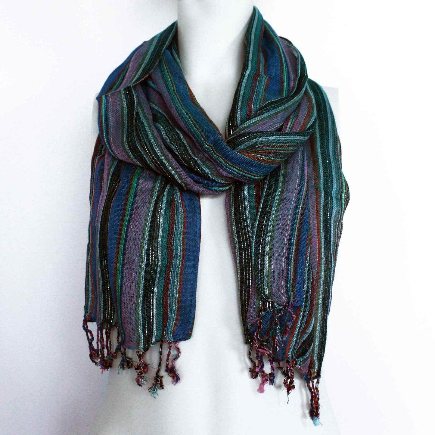 Vibrant purple bohemian style scarf with traditional Indian patterns and delicate fringe detailing.