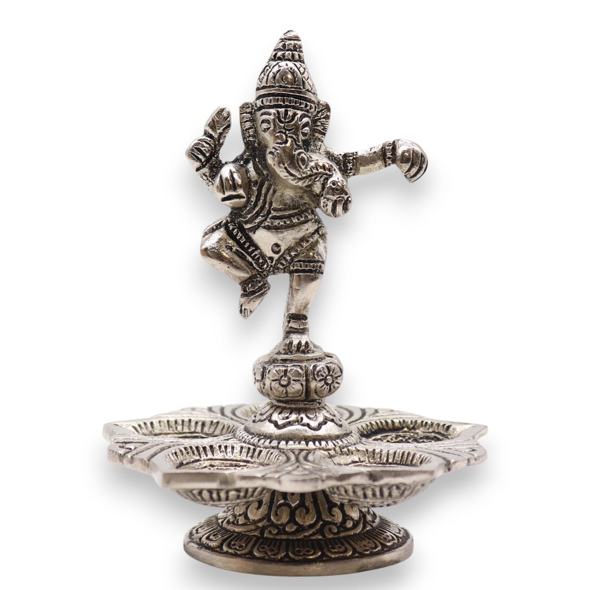 Detailed silver-coloured aluminium incense holder featuring a dancing Ganesha figure on a decorative circular base.