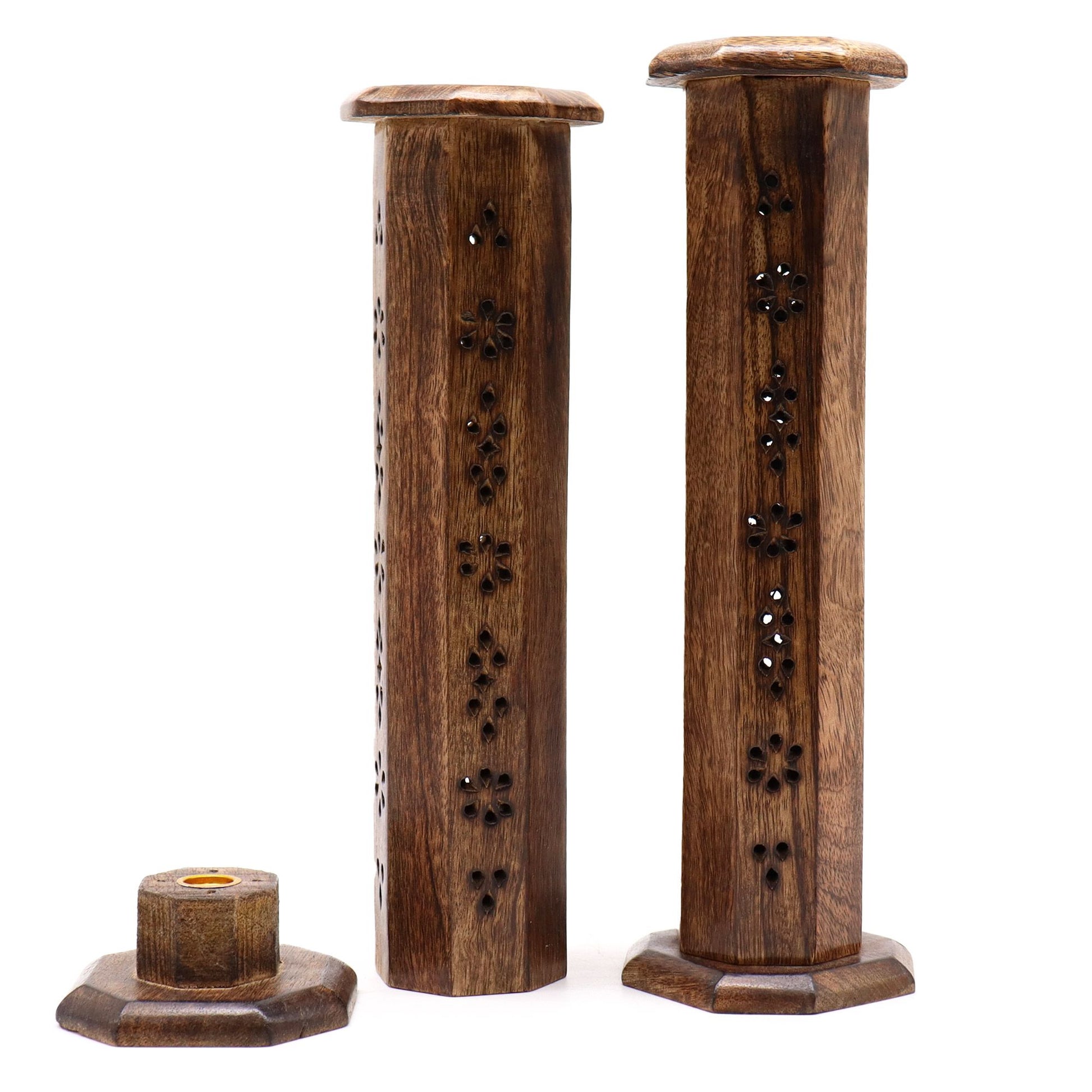 Intricately carved dark wood hexagonal smoke tower incense holder with geometric cutouts and a natural finish.