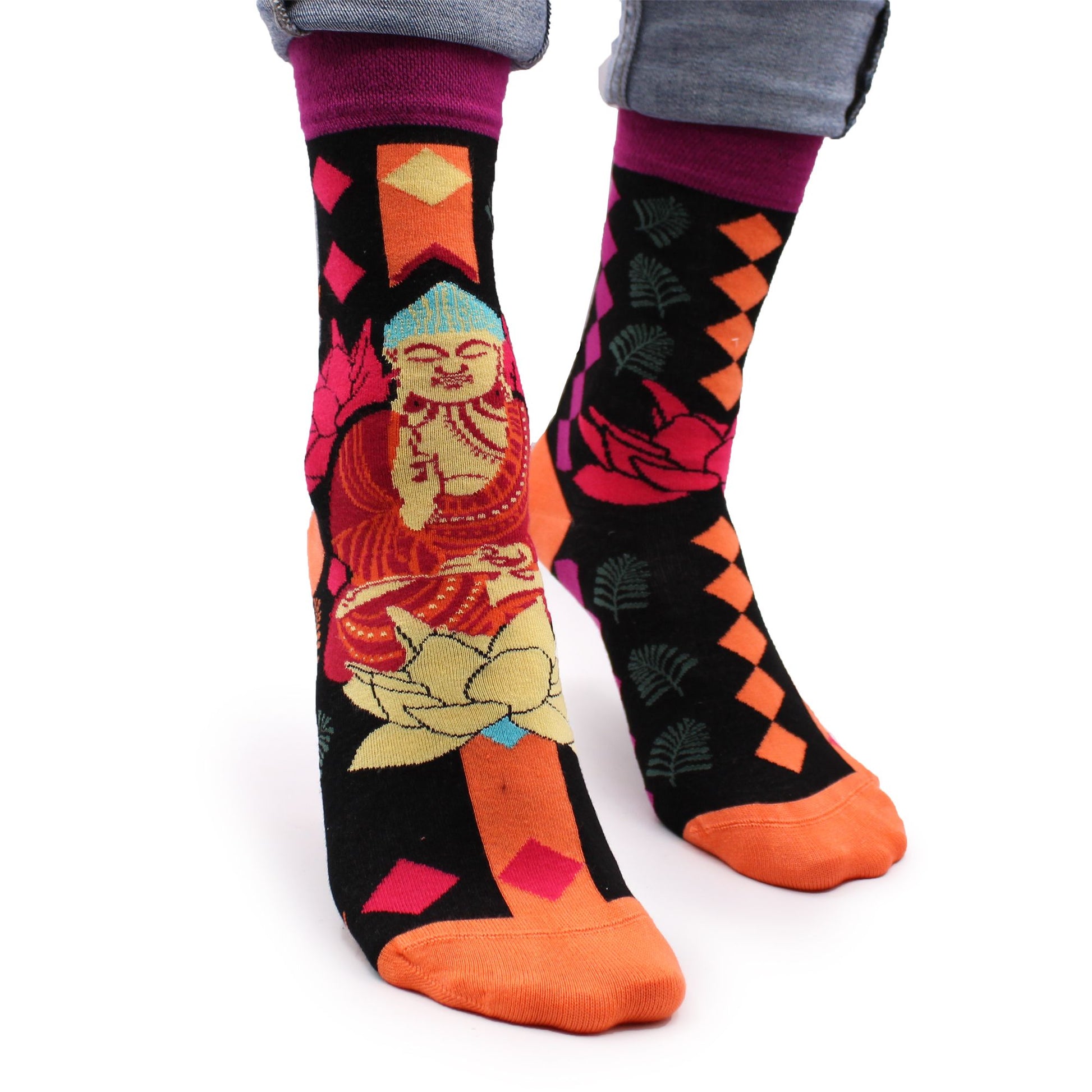 Pair of soft pink bamboo socks featuring a decorative Buddha and lotus flower pattern in a sustainable knit.
