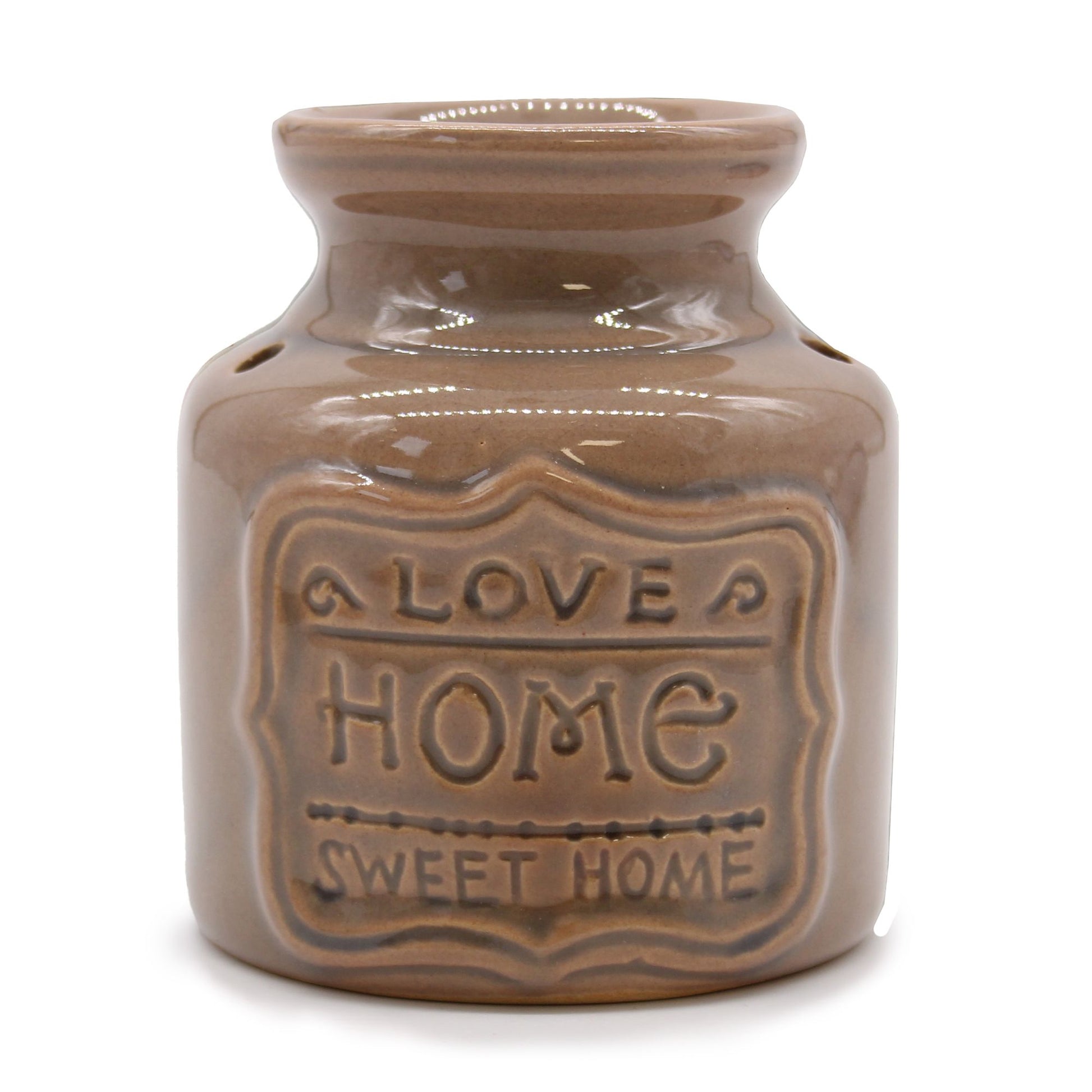 Large colourful ceramic oil burner with decorative cut-out text reading Home Sweet Home and Love.