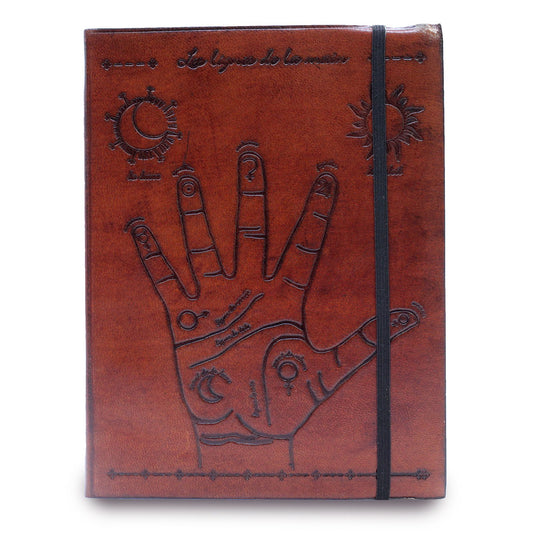 Medium black vegetable leather notebook featuring a gold palmistry hand design and a secure elastic closure strap.