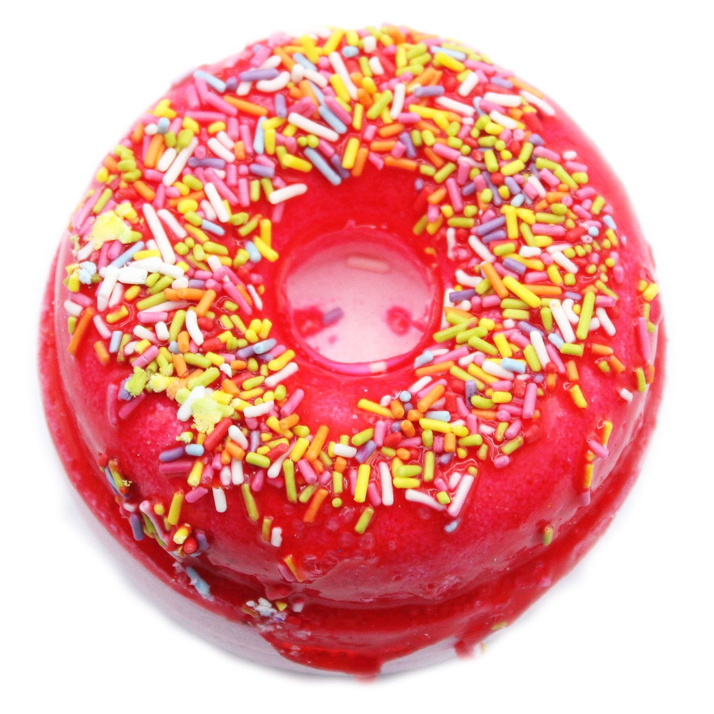 Two colourful donut-shaped bath fizzers decorated with yellow and pink frosting-style toppings and sprinkles.