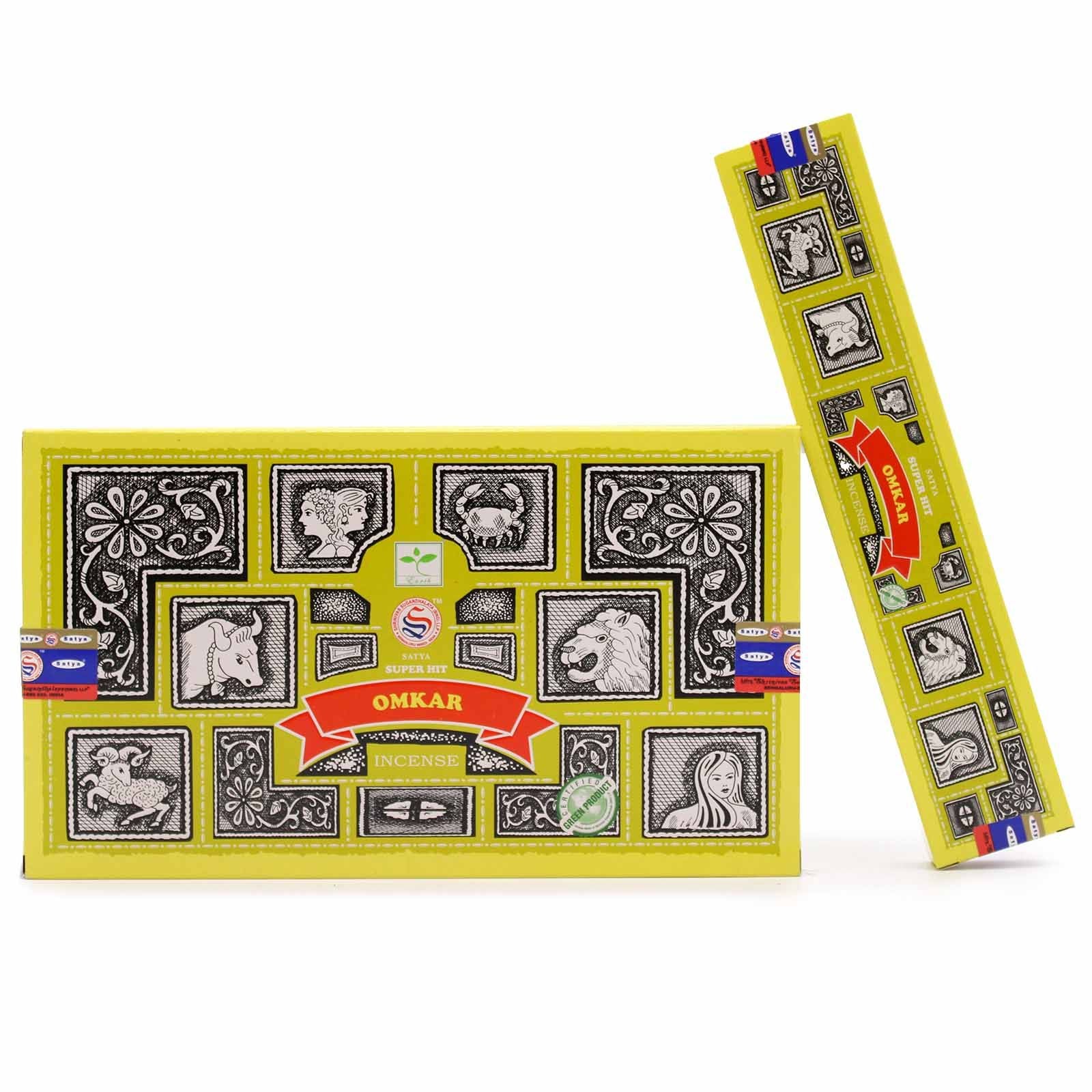 Hand-rolled masala incense sticks in a traditional blue and yellow box for spiritual relaxation.