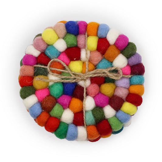 Four circular coasters made from small, colourful felt balls arranged in a textured round pattern.