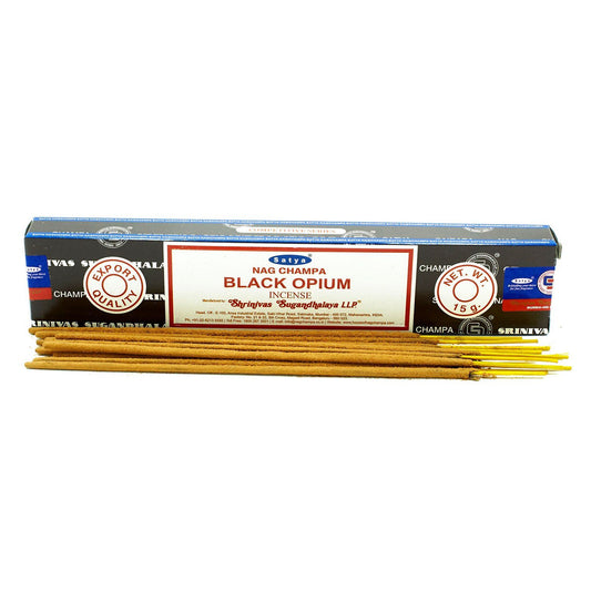 Hand-rolled incense sticks in a decorative box with a deep blue and black floral design.