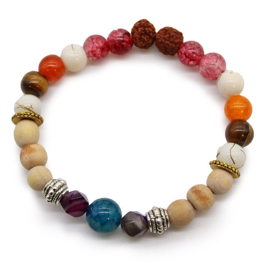 Handcrafted adjustable bangle featuring white, black and grey beads representing Balinese spiritual balance.