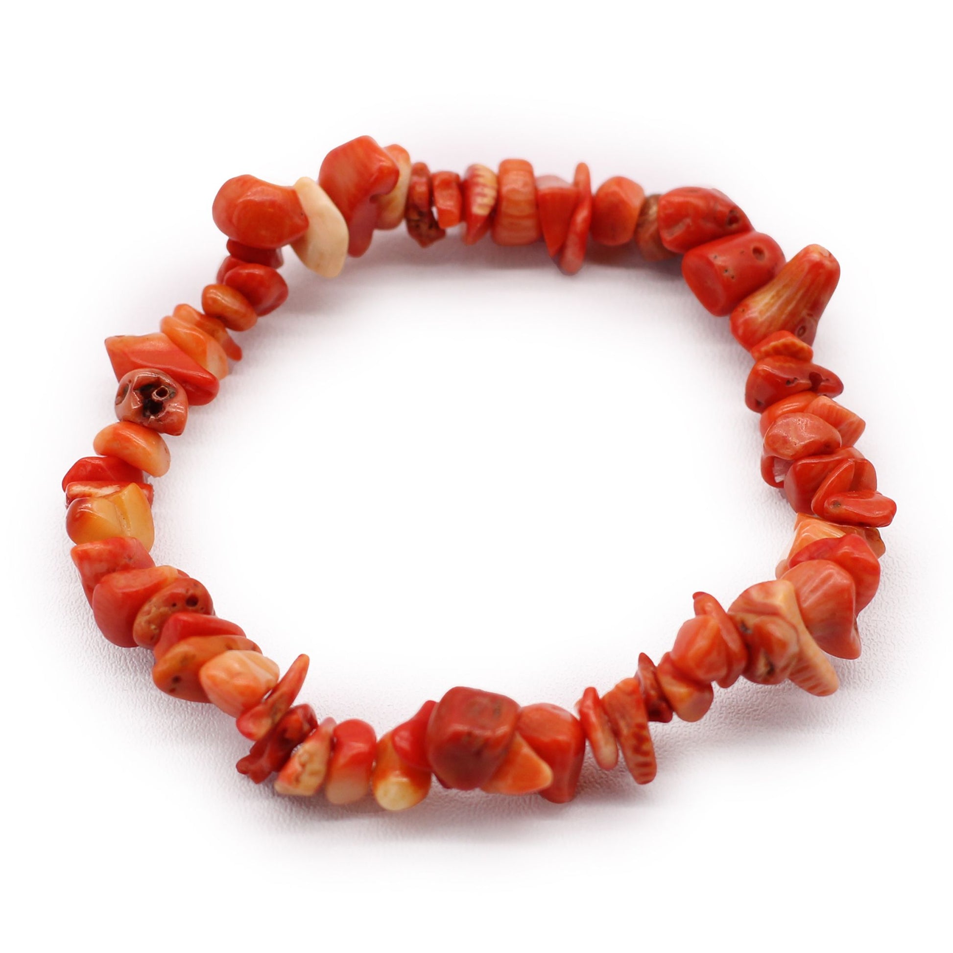 Handcrafted elasticated bracelet featuring small polished coralite stone chips in vibrant earthy red and orange tones.