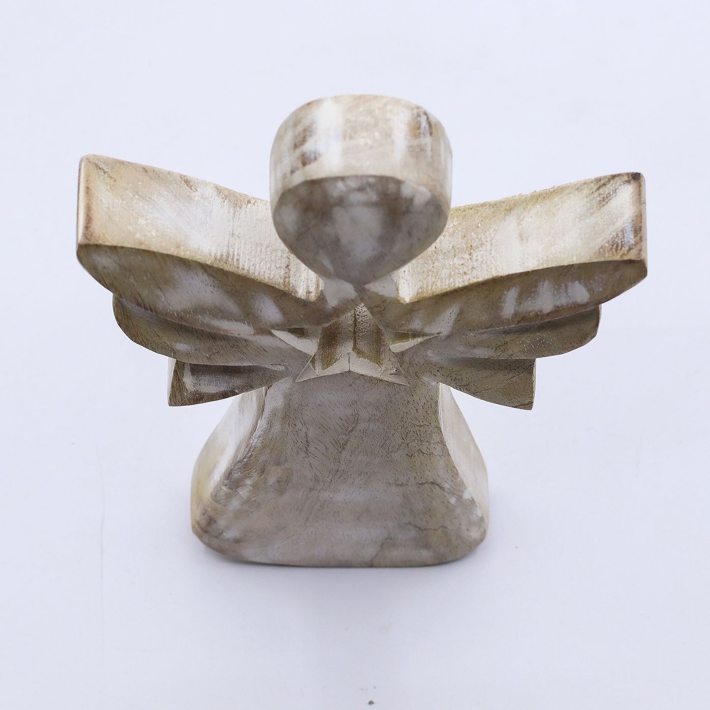 Hand-carved whitewashed mango wood angel figurine with a decorative star-shaped cut-out in the centre.