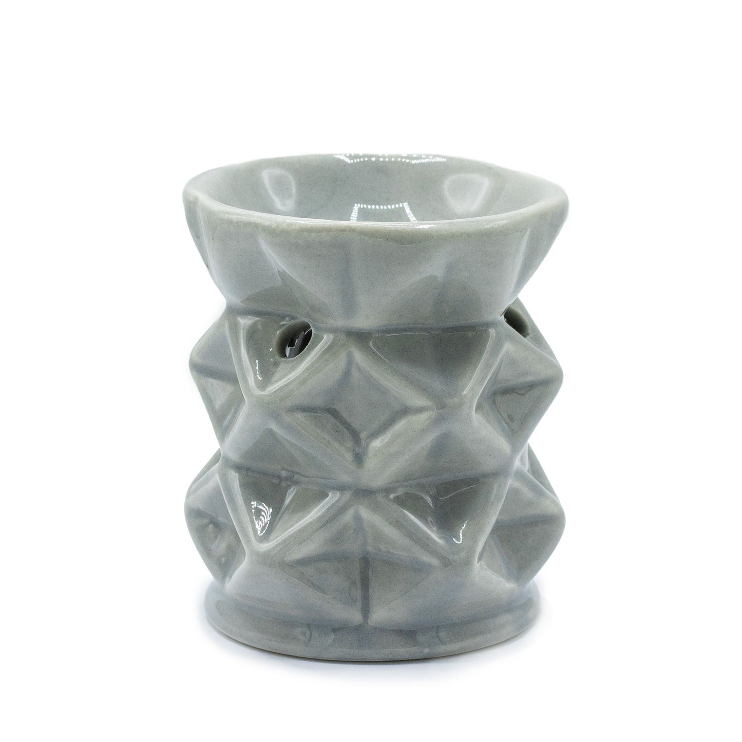 Modern grey ceramic oil burner featuring a minimalist geometric pattern with a cut-out design for a tealight candle.