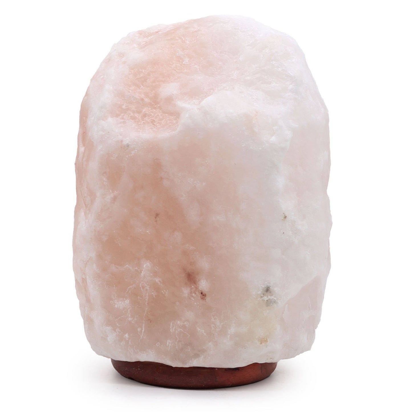 Extra large natural Himalayan salt lamp on a wooden base emitting a warm orange glow.