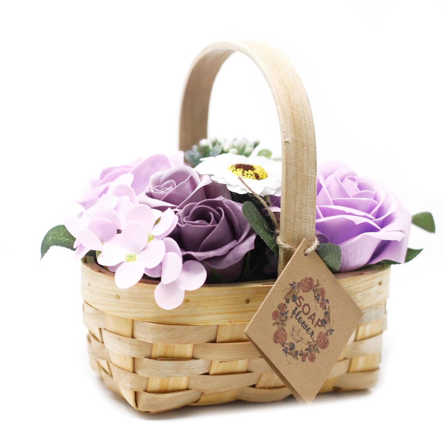 Medium lilac soap flower bouquet with roses and sunflowers in a rustic wicker basket.
