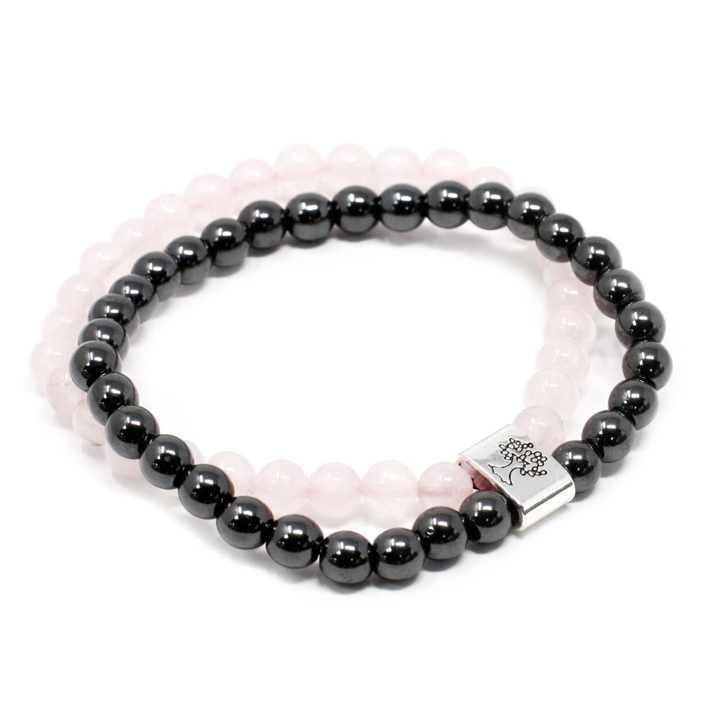 Handcrafted rose quartz gemstone bead bracelet with small magnetic spacers on a flexible elastic cord.
