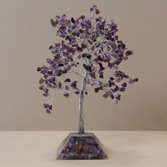Handmade Amethyst gemstone tree with 320 crystal chips on a pyramid shaped orgonite base.