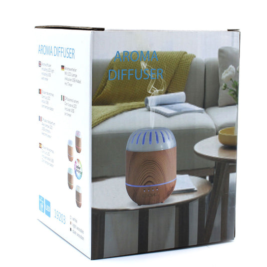Minimalist white ultrasonic aroma diffuser with a sleek cylindrical design and subtle LED light ring.