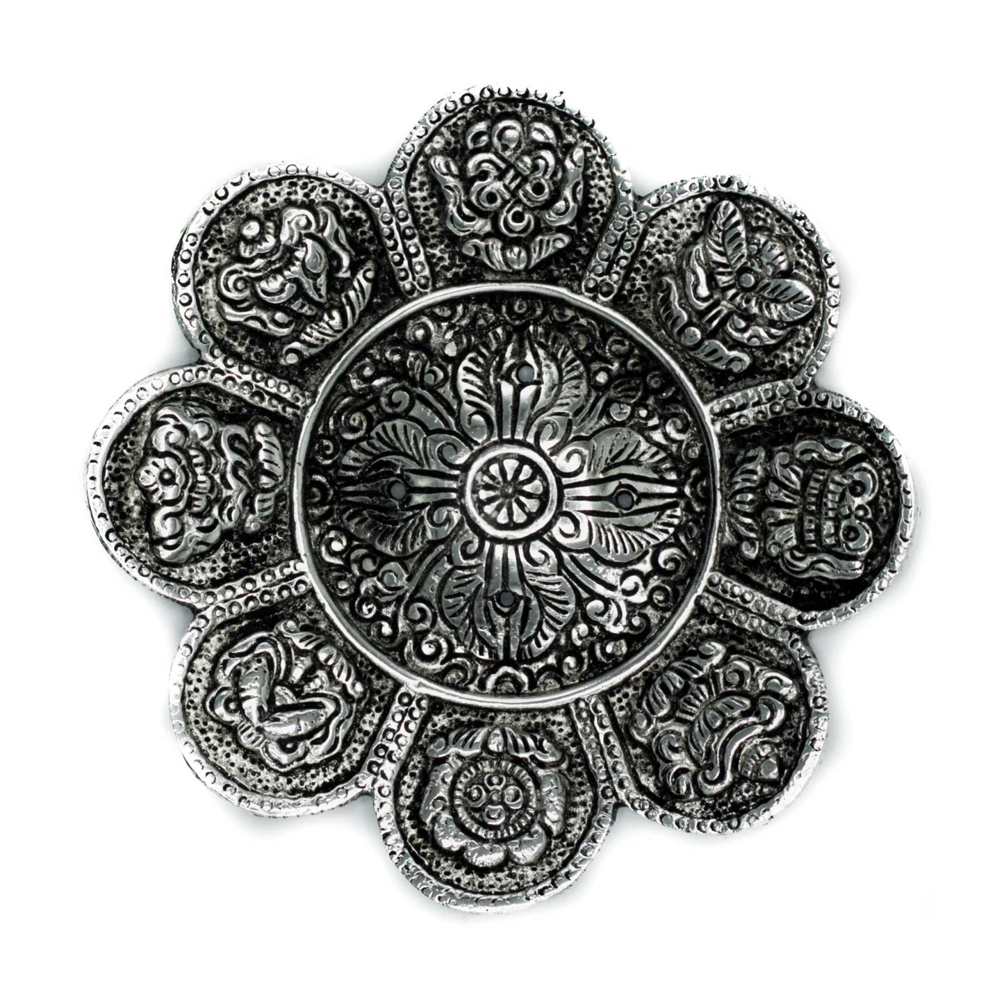 Handcrafted polished aluminium incense holder with engraved Tibetan symbols and a tall cylindrical design.