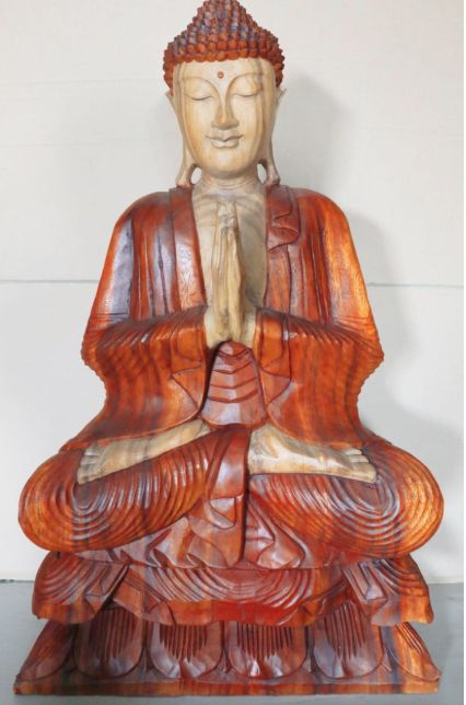 Large hand-carved wooden Buddha statue in a welcoming pose, crafted from natural Suar wood with intricate details.