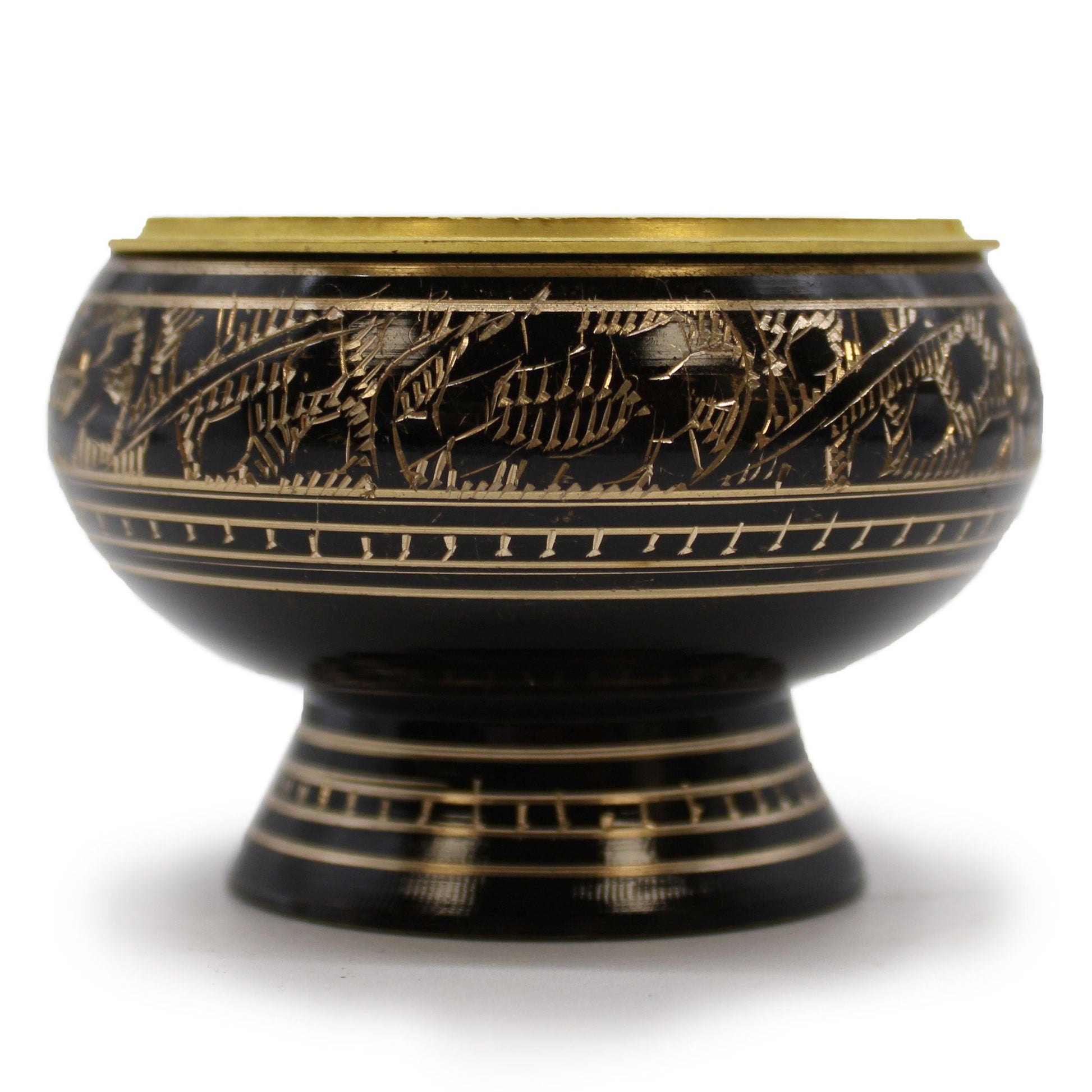 Intricately engraved solid brass charcoal incense burner with a removable mesh lid on a dark background.