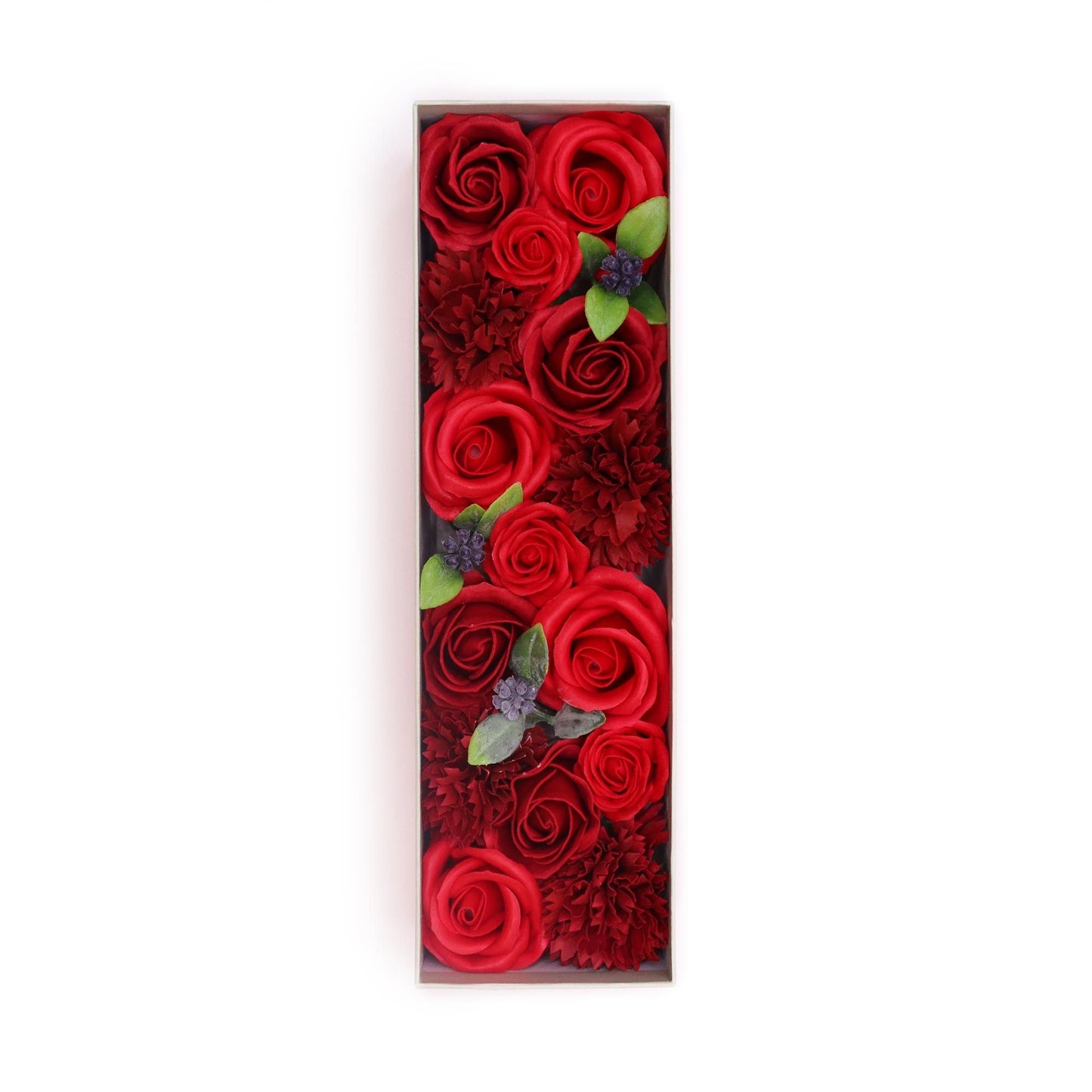 Elegant long gift box filled with realistic red soap rose petals and delicate greenery.