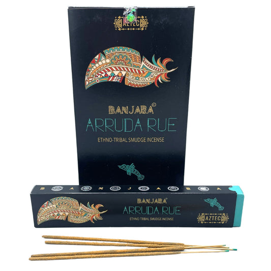 Handcrafted incense sticks in a decorative packet with tribal artwork and white floral details.