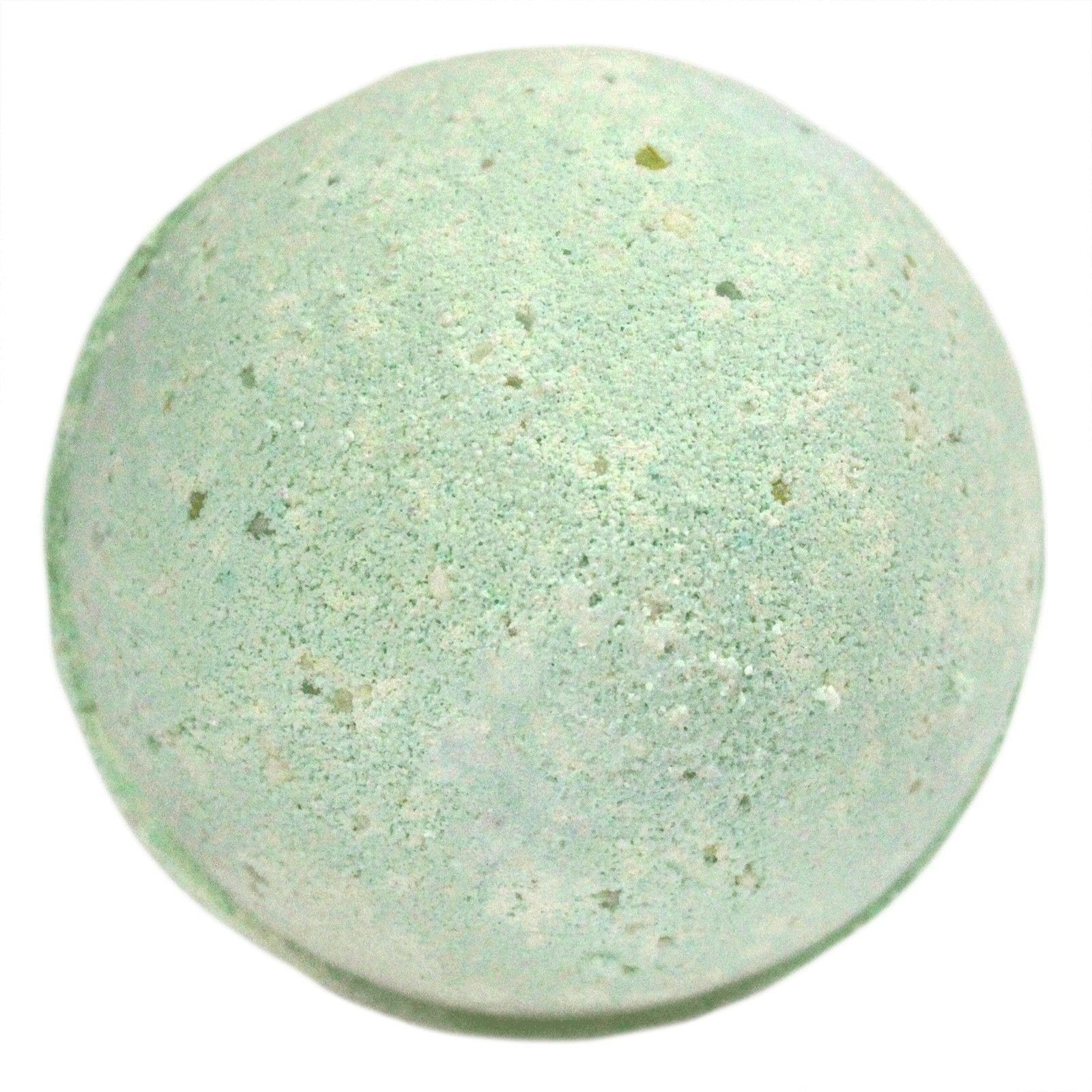 Large round green and white speckled bath bomb with a textured surface on a plain background.