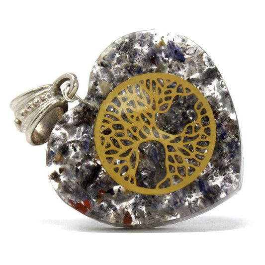 Heart-shaped orgonite pendant featuring a Tree of Life symbol over natural gemstone chips and copper filings.