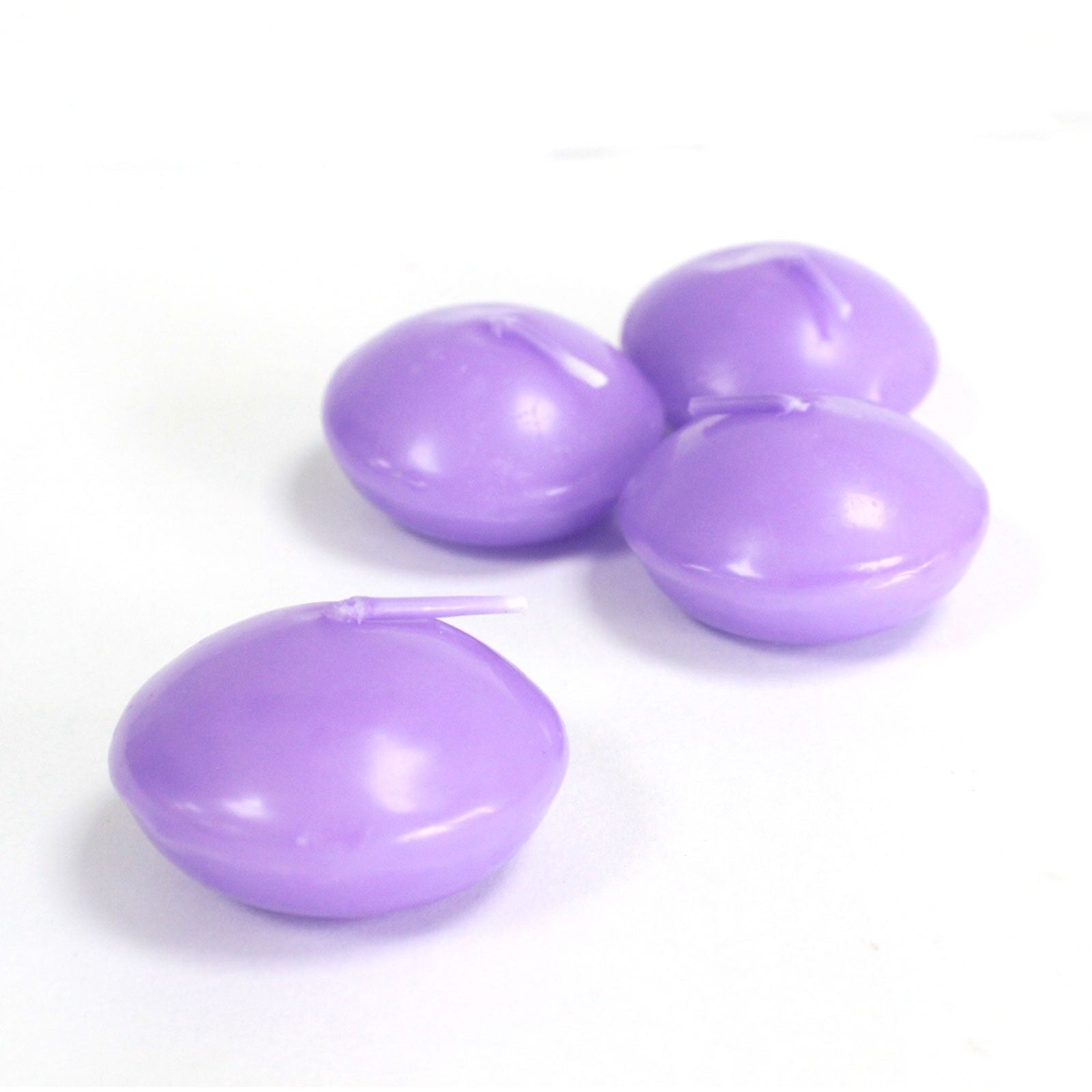 Small round lilac-coloured floating candle with a smooth finish and central wick.