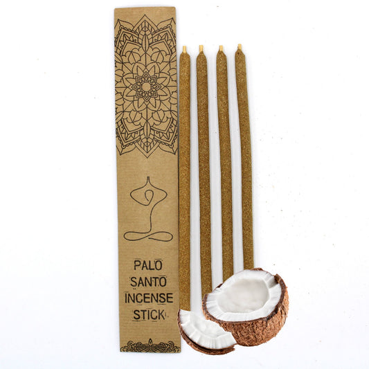 Large hand-rolled Palo Santo incense sticks with a coconut scent, displayed on a wooden surface.