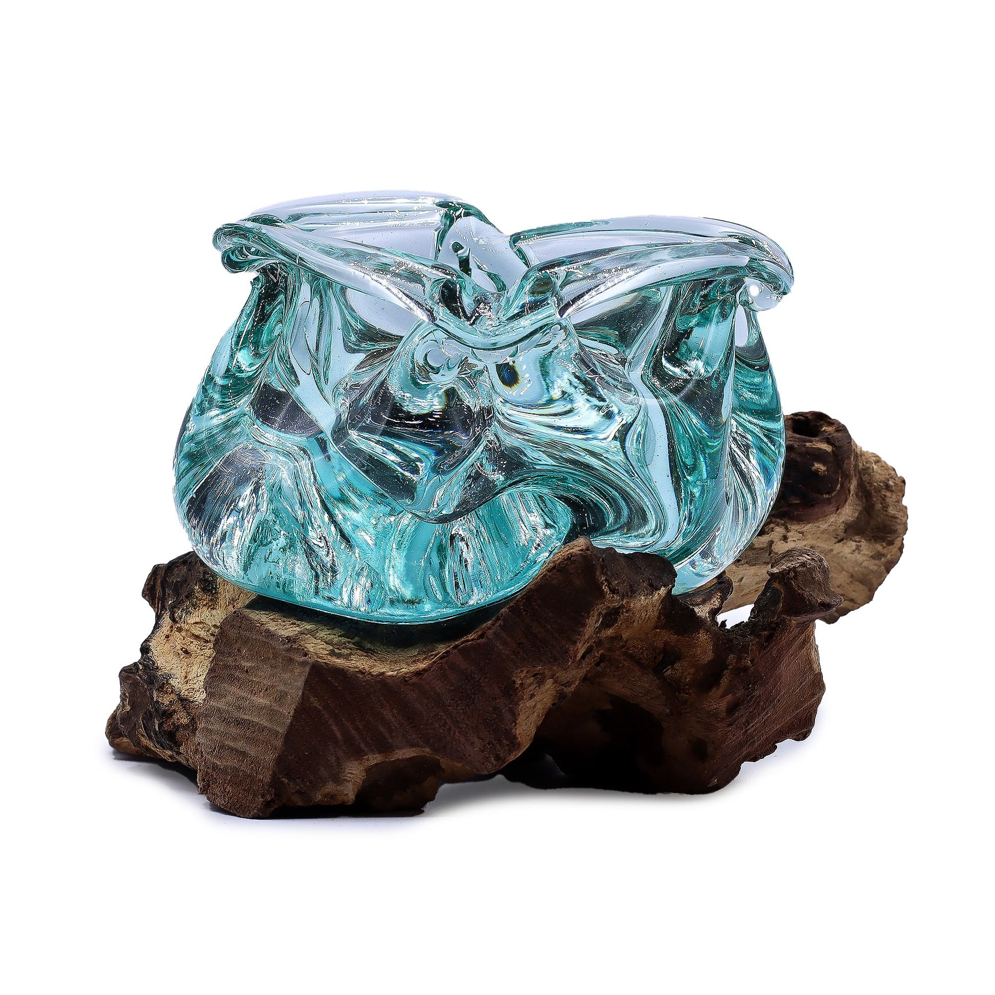 Hand-blown molten glass bowl shaped as an ashtray or candle holder resting on a natural gnarled wood base.
