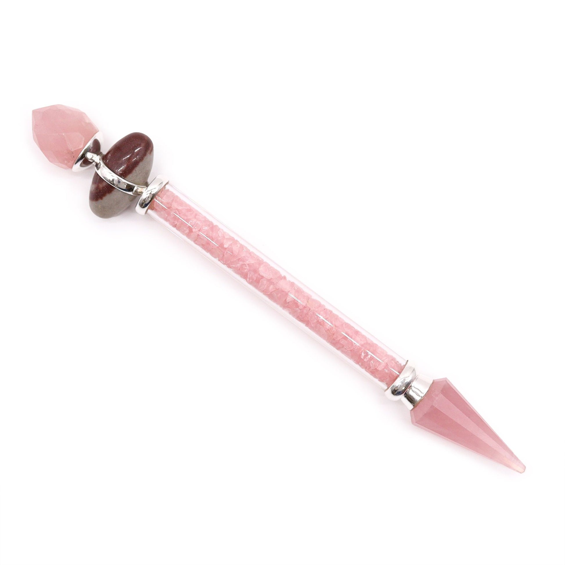 Smooth pink rose quartz gemstone carved into a sacred shiva lingam wand shape with a polished finish.