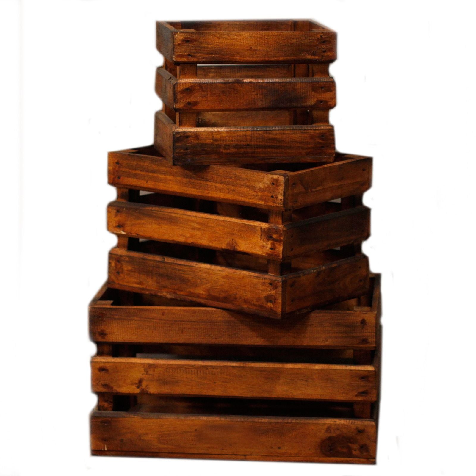 Trio of rustic brown wooden storage crates in varying sizes for home organization and display.