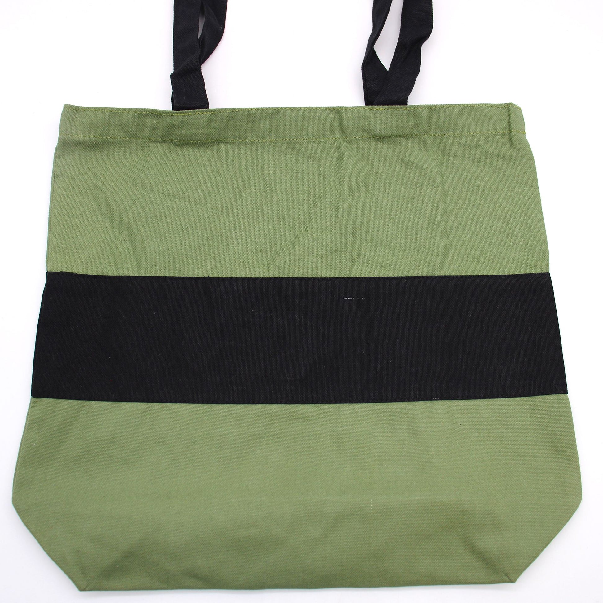 Durable two-tone cotton tote bag in green and black with long handles for comfortable shoulder carrying.