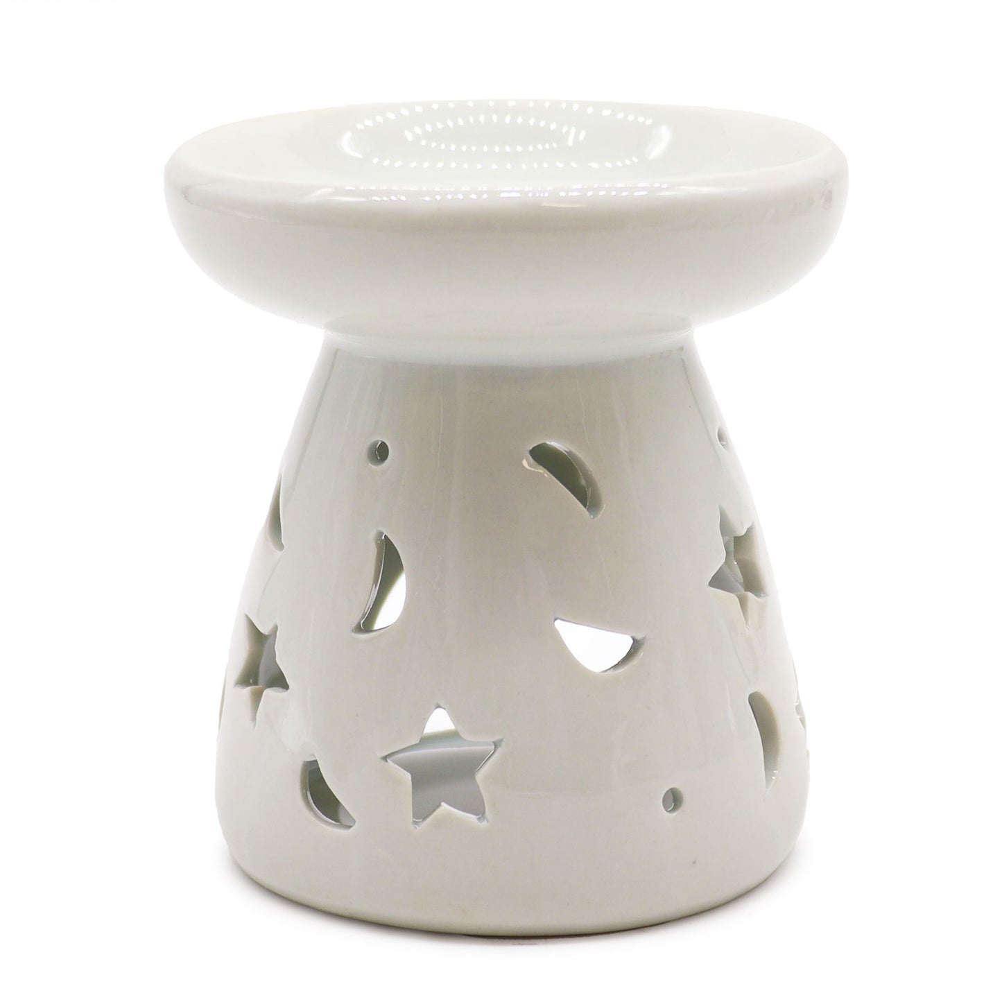 Large classic white ceramic oil burner with decorative moon and star cut-outs and a smooth finish.