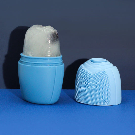 Sleek blue silicone ice face roller tool for cooling facial massage and skin rejuvenation.