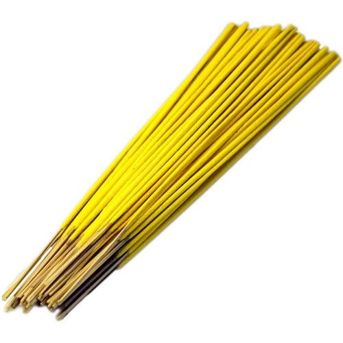 Large bundle of thin yellow unfragranced raw incense sticks tied together.