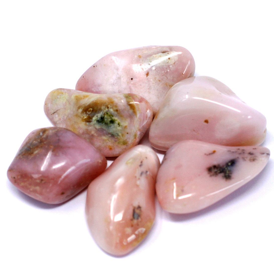 Collection of smooth, polished Peruvian Opal tumble stones in varying shades of soft blue and earthy green.
