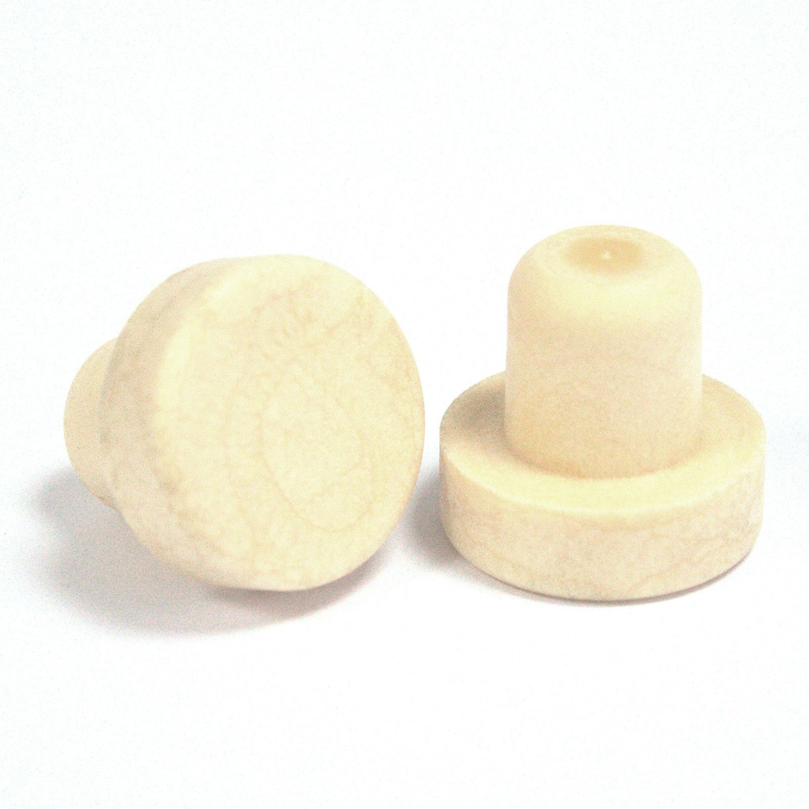Round wooden-style replacement cap for a glass reed diffuser bottle in a minimalist setting.