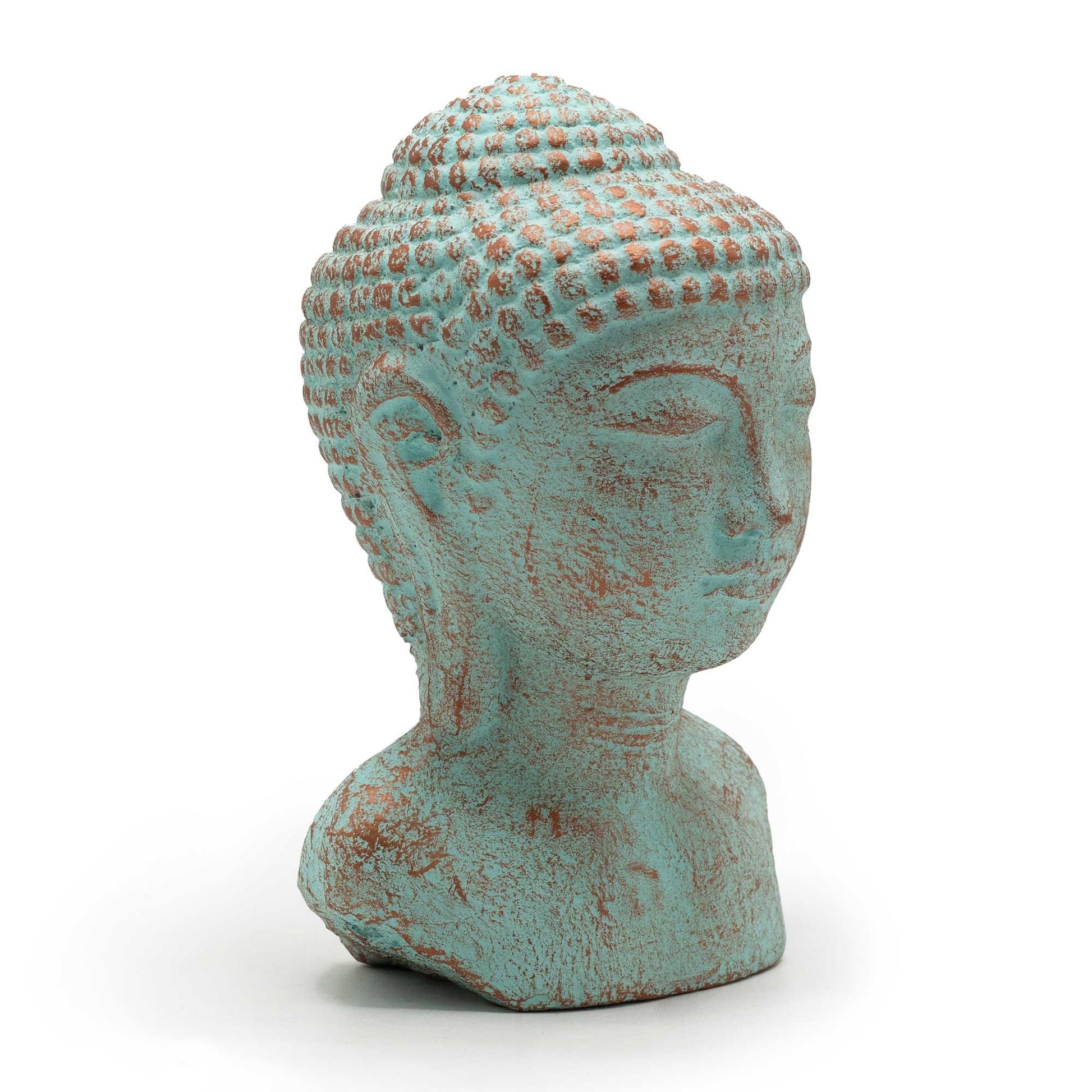 Detailed concrete Buddha head statue with a weathered antique green copper finish and peaceful expression.
