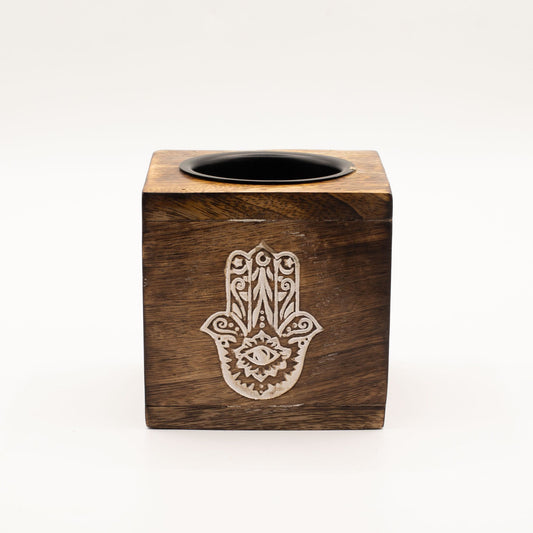 Square mango wood oil burner with an engraved Hamsa hand symbol on the side.