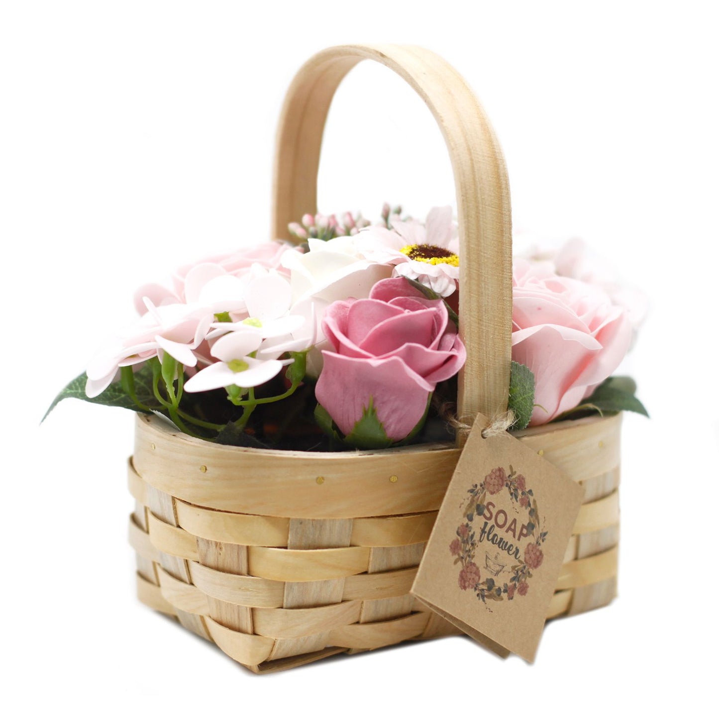 Elegant pink soap flower arrangement in a rustic wicker basket featuring roses, hyacinths and a sunflower.